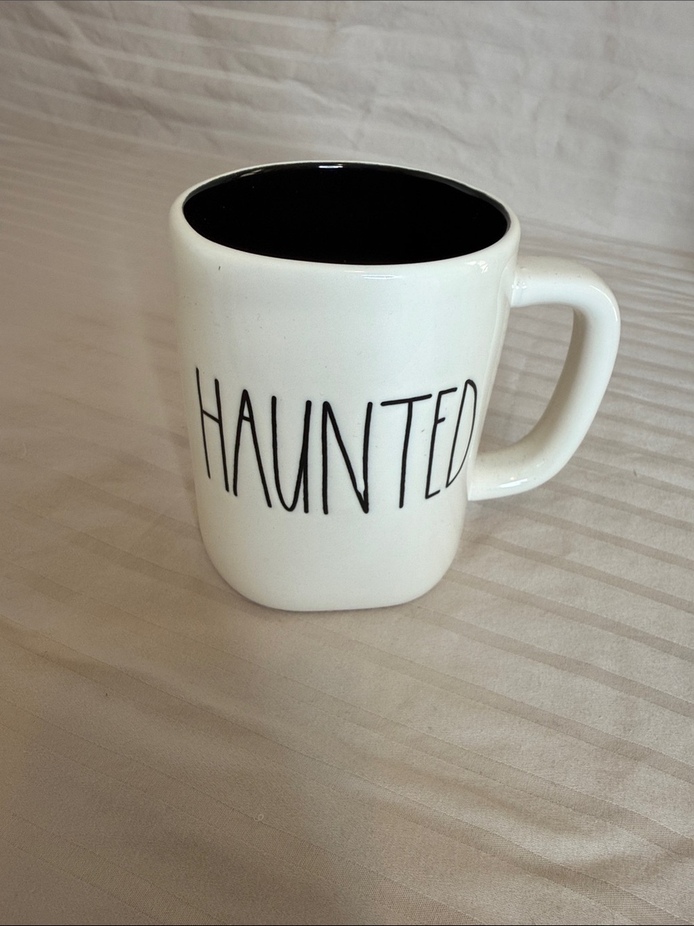 Rae Dunn White Ceramic 'HAUNTED' Mug with Black Interior